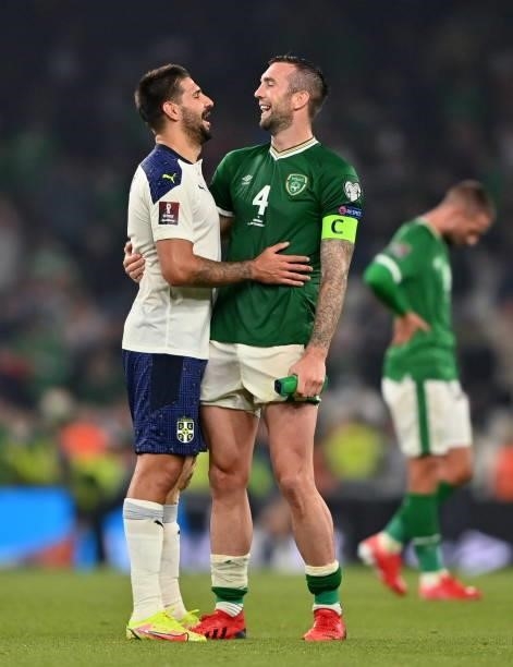 Dublin , Ireland - 7 September 2021; Shane Duffy of Republic of Ireland, right, and Aleksandar Mitrovi of Serbia after the FIFA World Cup 2022...