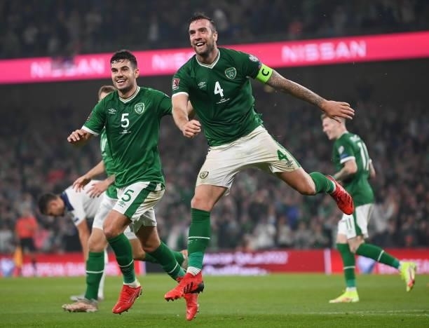 Dublin , Ireland - 7 September 2021; John Egan and Shane Duffy of Republic of Ireland celebrate their side's first goal, an own goal scored by Nikola...