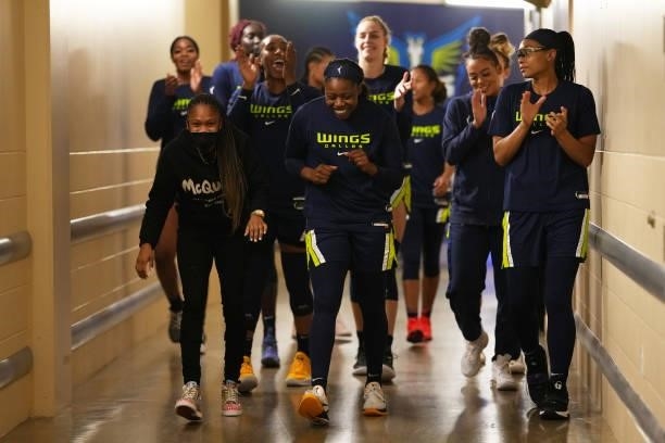 Dallas Wings players walk down the tunnel before the game against the Connecticut Sun on September 7, 2021 at College Park Center in Arlington, TX....