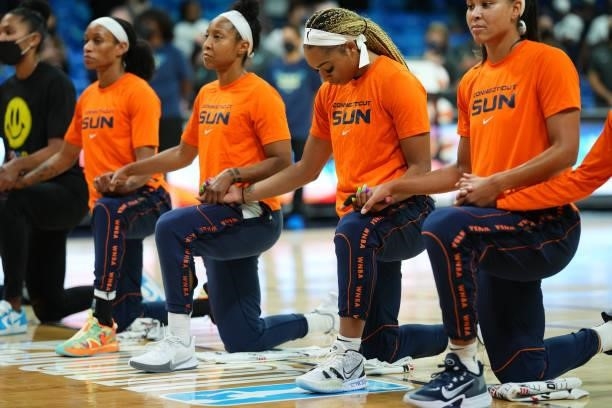 DiJonai Carrington of the Connecticut Sun and teammates look on before the game against the Dallas Wings on September 7, 2021 at College Park Center...
