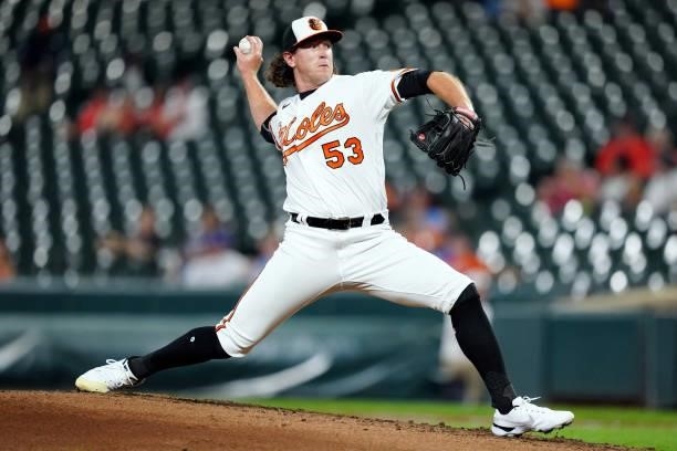 Mike Baumann of the Baltimore Orioles pitches during the game between the Kansas City Royals and the Baltimore Orioles at Oriole Park at Camden Yards...