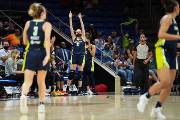 Bella Alarie of the Dallas Wings cheers from the bench during the game against the Connecticut Sun on September 7, 2021 at College Park Center in...