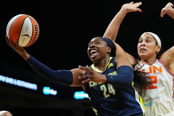 Arike Ogunbowale of the Dallas Wings shoots the ball during the game against the Connecticut Sun on September 7, 2021 at College Park Center in...