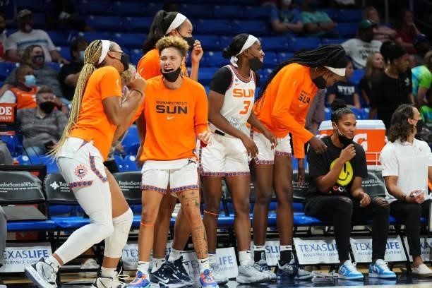 Natisha Hiedeman of the Connecticut Sun and teammates celebrate from the bench during the game against the Dallas Wings on September 7, 2021 at...