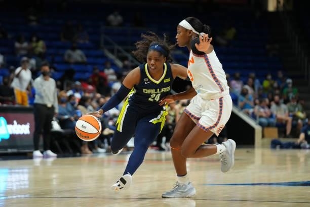 Arike Ogunbowale of the Dallas Wings drives to the basket during the game against the Connecticut Sun on September 7, 2021 at College Park Center in...