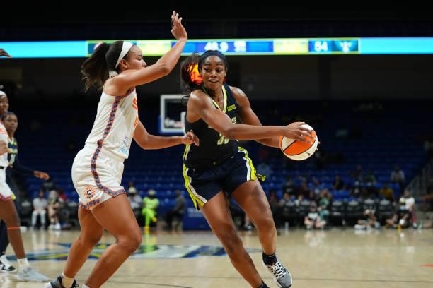 Chelsea Dungee of the Dallas Wings drives to the basket during the game against the Connecticut Sun on September 7, 2021 at College Park Center in...