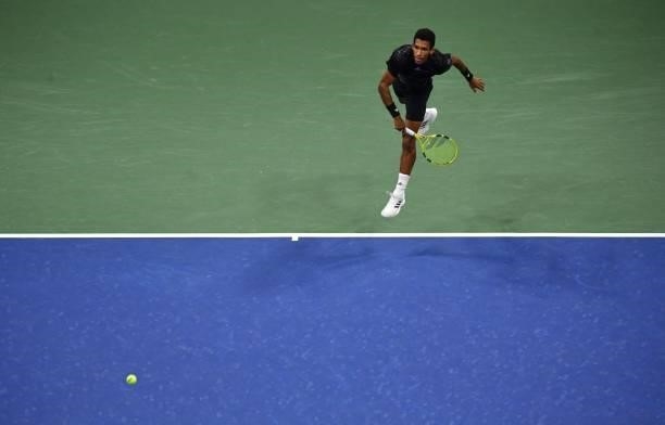 Canada's Felix Auger-Aliassime hits a return to Spain's Carlos Alcaraz during their 2021 US Open Tennis tournament men's quarter-finals match at the...