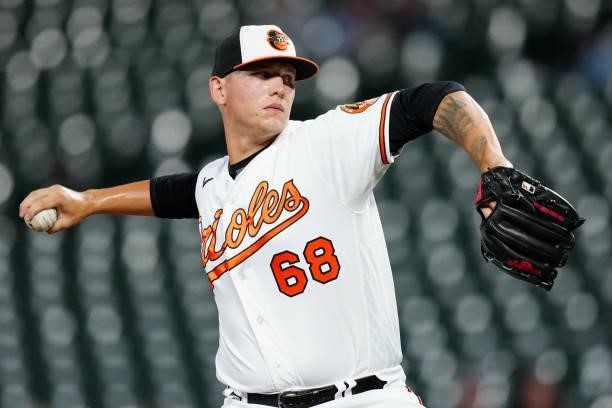 Tyler Wells of the Baltimore Orioles pitches during the game between the Kansas City Royals and the Baltimore Orioles at Oriole Park at Camden Yards...