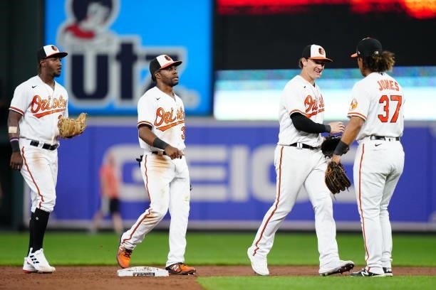 Jorge Mateo, Cedric Mullins, Austin Hays and Jahmai Jones of the Baltimore Orioles celebrate after the Orioles defeated the Kansas City Royals 7-3 at...