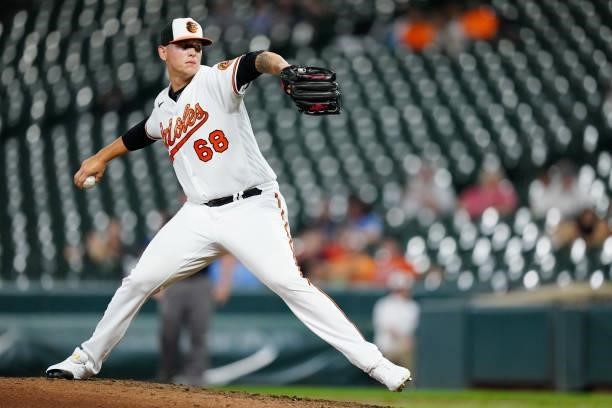Tyler Wells of the Baltimore Orioles pitches during the game between the Kansas City Royals and the Baltimore Orioles at Oriole Park at Camden Yards...
