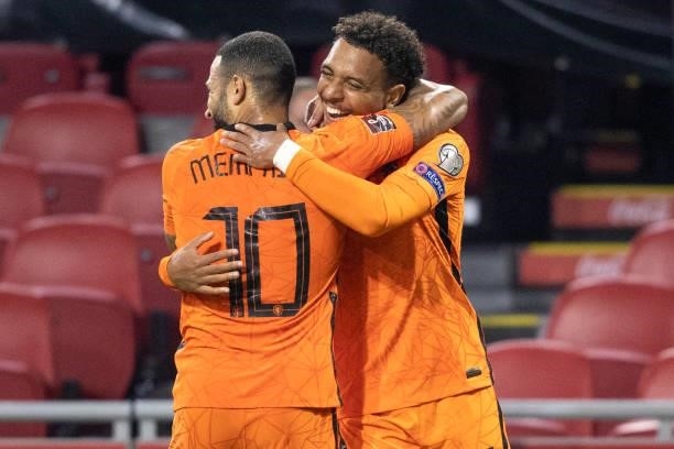 Donyell Malen of Netherlands cheers after his goal 6:1 with Memphis Depay of Netherlands during the 2022 FIFA World Cup Qualifier match between...