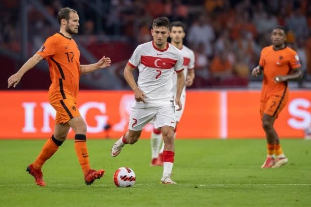 Daley blind of Netherlands and Cengiz Under of Turkey Battle for the ball during the 2022 FIFA World Cup Qualifier match between Netherlands and...