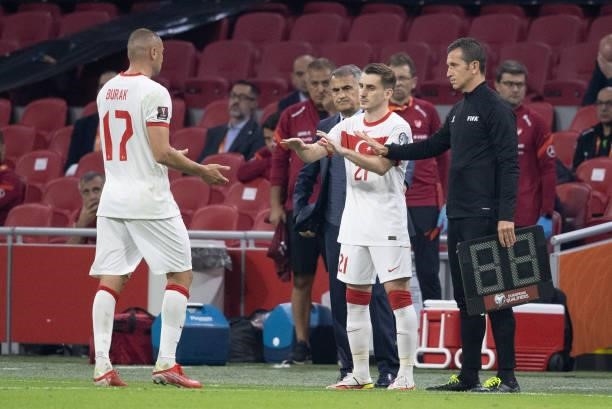 Burak Yilmaz of Turkey and Kerem Akturoglu of Turkey substitution during the 2022 FIFA World Cup Qualifier match between Netherlands and Turkey at...