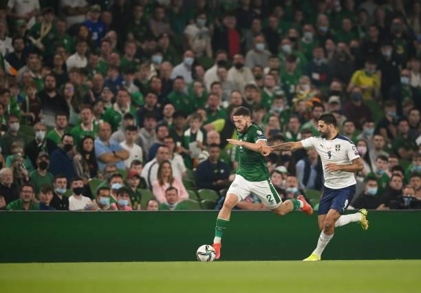 Dublin , Ireland - 7 September 2021; Matt Doherty of Republic of Ireland in action against Aleksandar Mitrovi of Serbia during the FIFA World Cup...