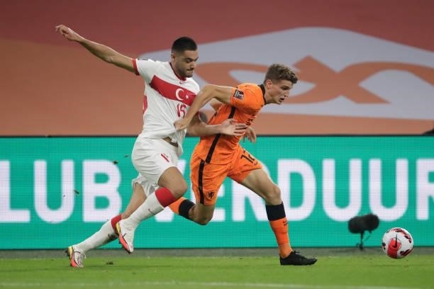 Ozan Kabak of Turkey, Guus Til of Holland during the World Cup Qualifier match between Holland v Turkey at the Johan Cruijff Arena on September 7,...