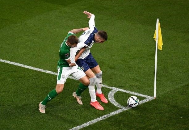 Dublin , Ireland - 7 September 2021; Strahinja Pavlovi of Serbia and James Collins of Republic of Ireland during the FIFA World Cup 2022 qualifying...