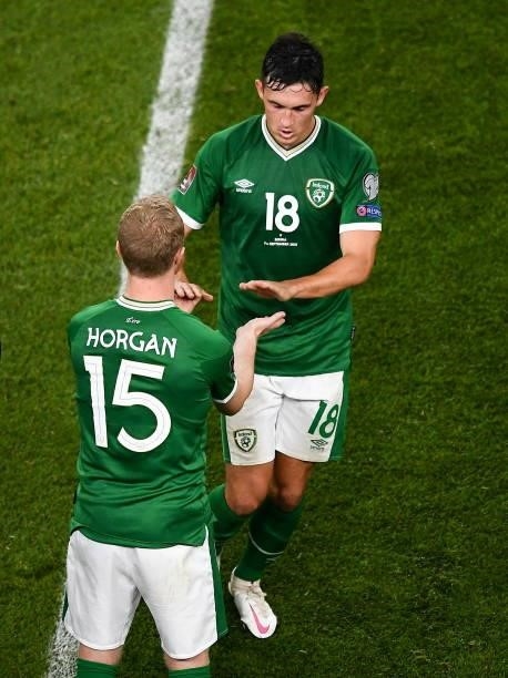 Dublin , Ireland - 7 September 2021; Jamie McGrath of Republic of Ireland is greeted by team-mate Daryl Horgan as he comes off for a second half...