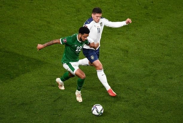 Dublin , Ireland - 7 September 2021; Andrew Omobamidele of Republic of Ireland and Luka Jovi of Serbia during the FIFA World Cup 2022 qualifying...