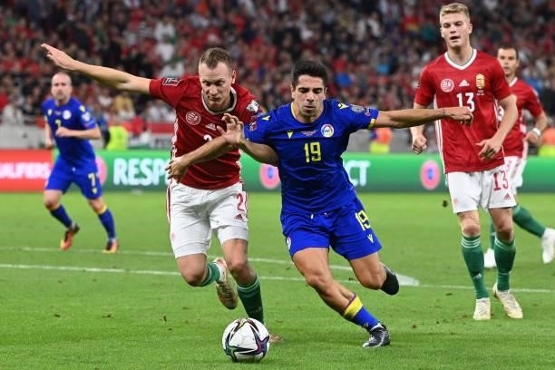 Andorra's forward Ricard Fernandez and Hungary's defender Adam Lang vie for the ball during the FIFA World Cup Qatar 2022 qualification Group I...