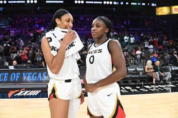 Ja Wilson of the Las Vegas Aces talks with Jackie Young after the game against the Minnesota Lynx on September 8, 2021 at the Michelob ULTRA Arena in...