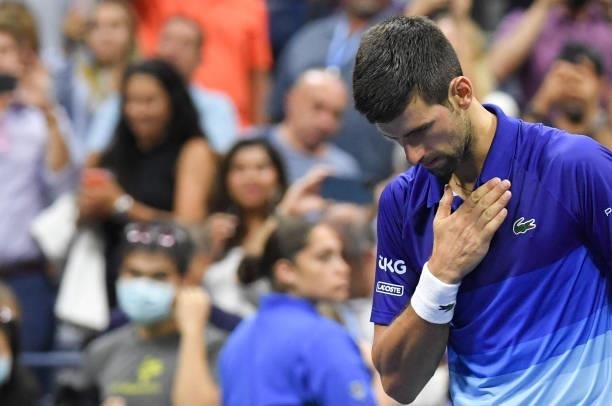 Serbia's Novak Djokovic celebrates his victory over Italy's Matteo Berrettini during their 2021 US Open Tennis tournament men's quarter-finals match...