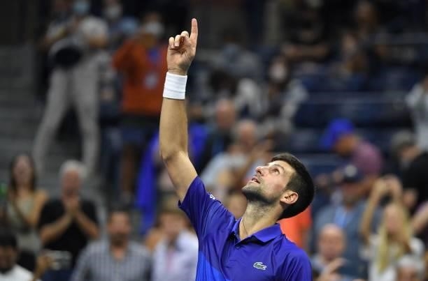 Serbia's Novak Djokovic celebrates after winning the match against Italy's Matteo Berrettini during their 2021 US Open Tennis tournament men's...