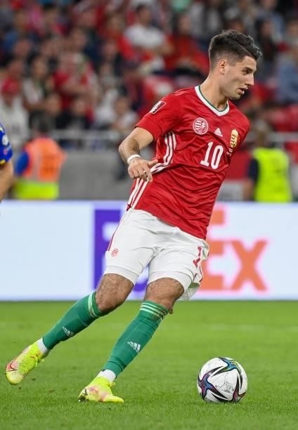 Hungary's midfielder Dominik Szoboszlai plays the ball during the FIFA World Cup Qatar 2022 qualification Group I football match between Hungary and...