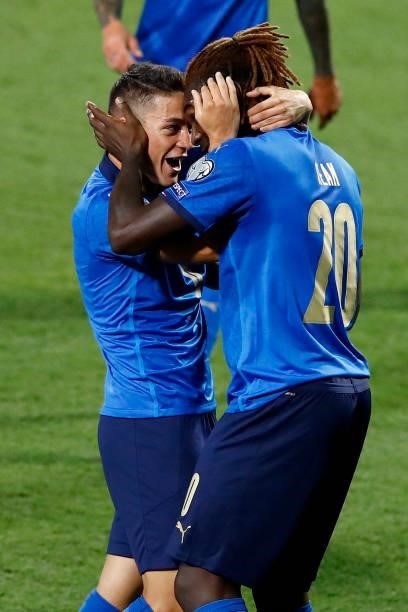 Giacomo Raspadori of Italy and Moise Kean of Italy celebrate after scoring their team's third goal during the 2022 FIFA World Cup Qualifier match...