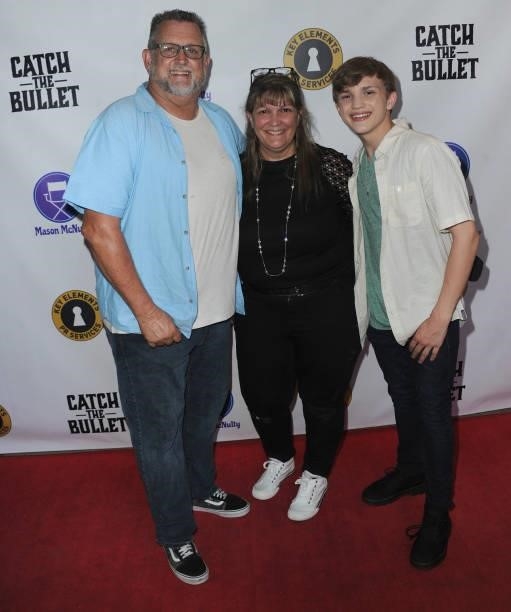 Mason McNulty with pareents arrive for the Red Carpet Screening Of "Catch The Bullet