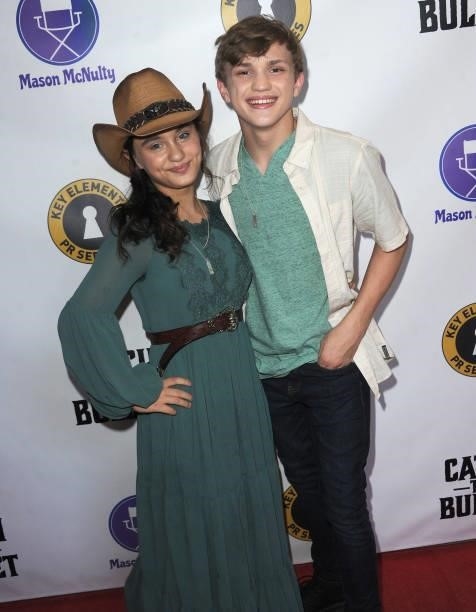Mason McNult and Izzie Florez arrive for the Red Carpet Screening Of "Catch The Bullet