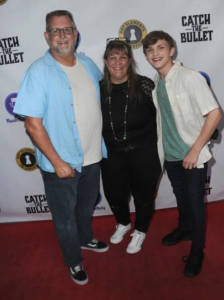 Mason McNulty with pareents arrive for the Red Carpet Screening Of "Catch The Bullet