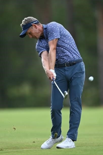 England's Luke Donnell plays a shot on the 9th on Day 1 of the PGA Championship at Wentworth Golf Club in Surrey, south west of London on September...