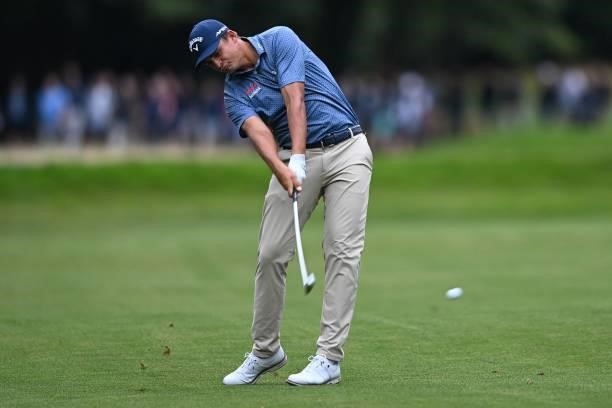 South Africa's Christiaan Bezuidenhoutplays a shot on the 17th on Day 1 of the PGA Championship at Wentworth Golf Club in Surrey, south west of...