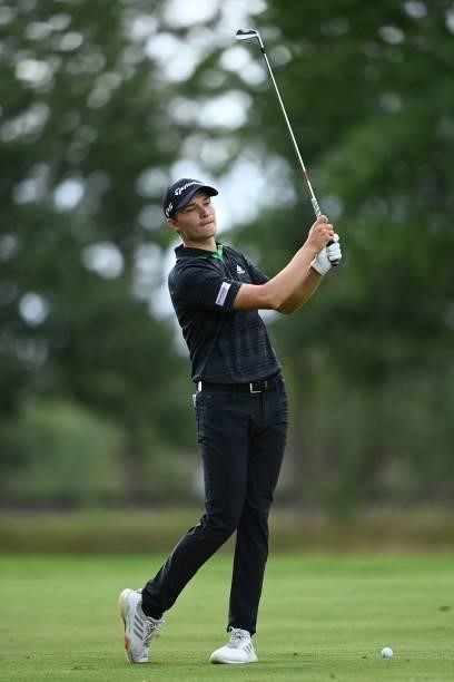 Denmark's Rasmus Hojgaard plays a shot on the 9th on Day 1 of the PGA Championship at Wentworth Golf Club in Surrey, south west of London on...