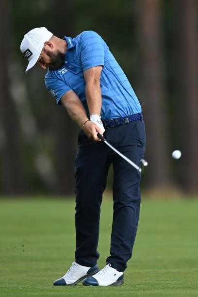 England's Andy Sullivan plays a shot on the 9th on Day 1 of the PGA Championship at Wentworth Golf Club in Surrey, south west of London on September...