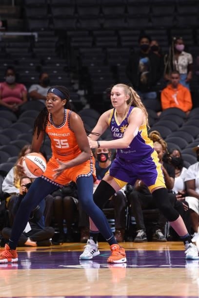 Lauren Cox of the Los Angeles Sparks plays defense on Jonquel Jones of the Connecticut Sun on September 9, 2021 at the Staples Center in Los Angeles,...