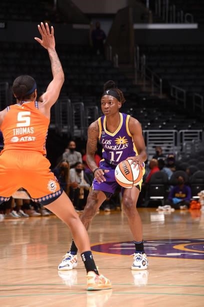 Jasmine Thomas of the Connecticut Sun plays defense on Erica Wheeler of the Los Angeles Sparks on September 9, 2021 at the Staples Center in Los...