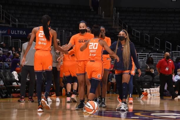 The Connecticut Sun celebrate during the game against the Los Angeles Sparks on September 9, 2021 at the Staples Center in Los Angeles, California....