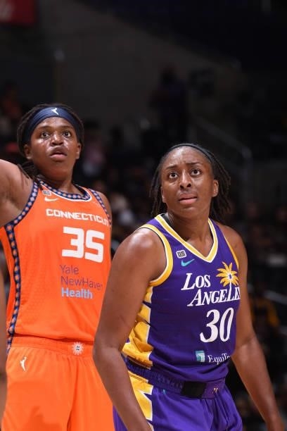 Jonquel Jones of the Connecticut Sun and Nneka Ogwumike of the Los Angeles Sparks look on during the game on September 9, 2021 at the Staples Center...