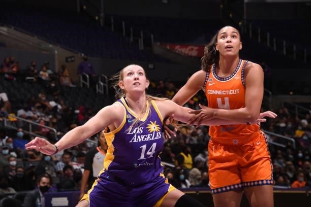 Lauren Cox of the Los Angeles Sparks and Stephanie Jones of the Connecticut Sun look up during the game on September 9, 2021 at the Staples Center in...