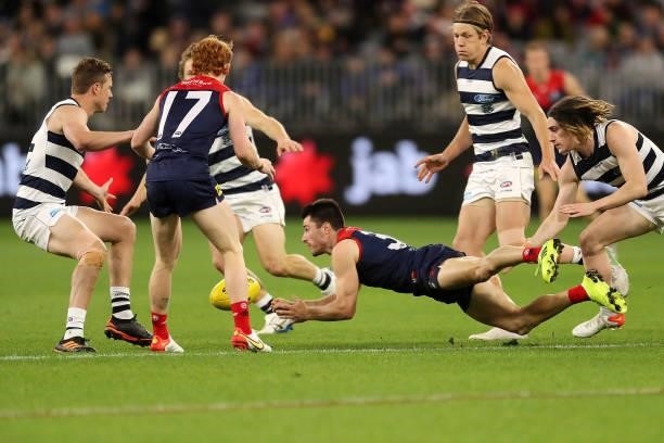 Alex Neal-Bullen of the Demons handpasses the ball during the 2021 AFL First Preliminary Final match between the Melbourne Demons and the Geelong...