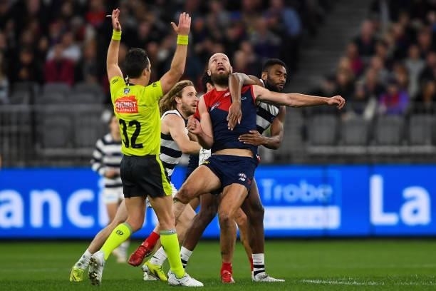 Max Gawn of the Demons competes in a ruck contest with Esava Ratugolea of the Cats during the 2021 AFL First Preliminary Final match between the...