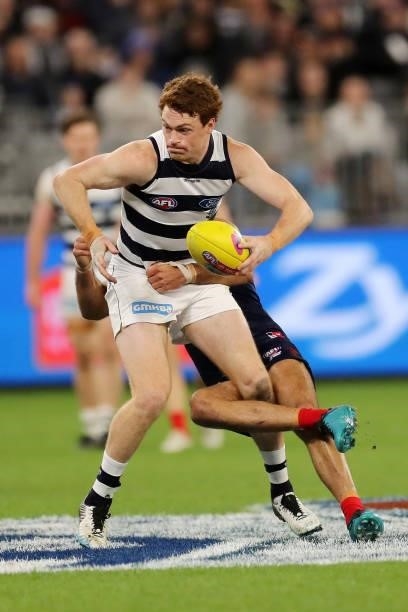 Gary Rohan of the Cats looks to pass the ball during the 2021 AFL First Preliminary Final match between the Melbourne Demons and the Geelong Cats at...