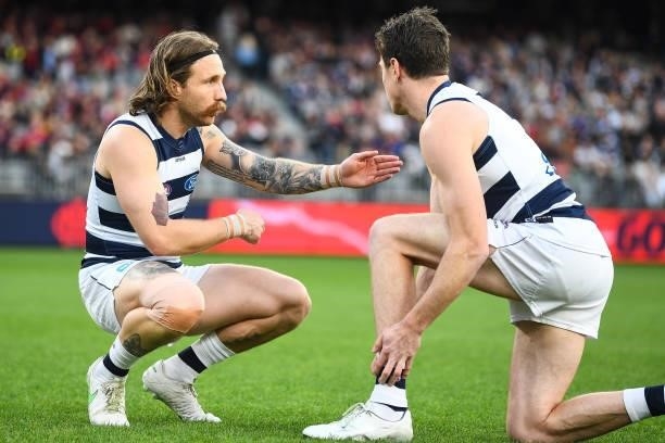 Zach Tuohy and Jeremy Cameron of the Cats chat at the at the warmup session during the 2021 AFL First Preliminary Final match between the Melbourne...