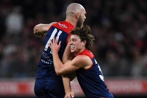 Max Gawn of the Demons and Tom Sparrow celebrates a goal during the 2021 AFL First Preliminary Final match between the Melbourne Demons and the...