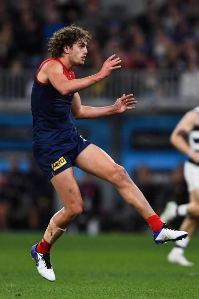Luke Jackson of the Demons kicks the ball during the 2021 AFL First Preliminary Final match between the Melbourne Demons and the Geelong Cats at...