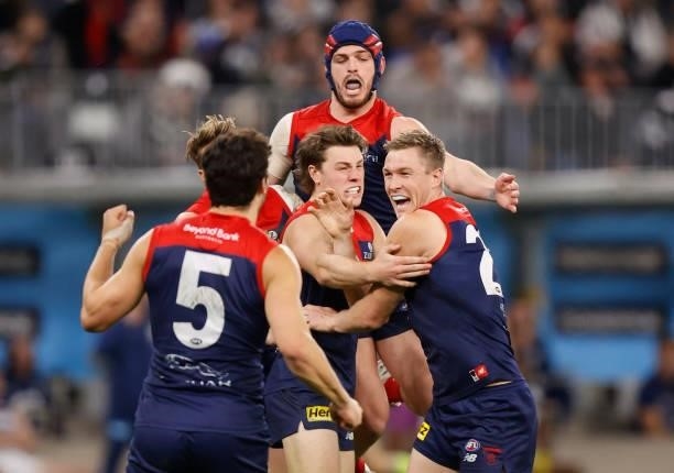 Christian Petracca, Tom Sparrow, Angus Brayshaw and Tom McDonald of the Demons celebrate during the 2021 AFL First Preliminary Final match between...