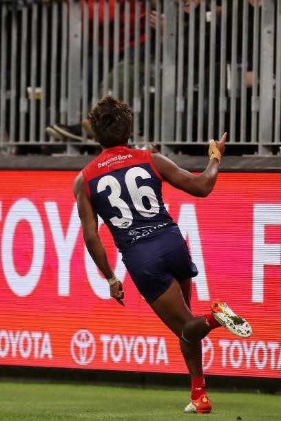 Kysaiah Pickett of the Demons celebrates after scoring a goal during the 2021 AFL First Preliminary Final match between the Melbourne Demons and the...