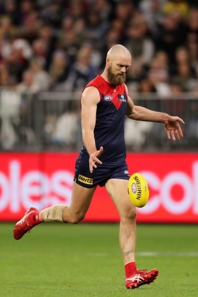Max Gawn of the Demons kicks on goal during the 2021 AFL First Preliminary Final match between the Melbourne Demons and the Geelong Cats at Optus...