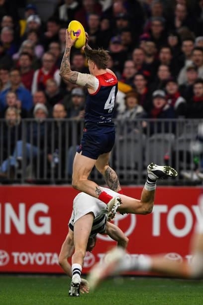 James Harmes of the Demons reaches for a mark during the 2021 AFL First Preliminary Final match between the Melbourne Demons and the Geelong Cats at...